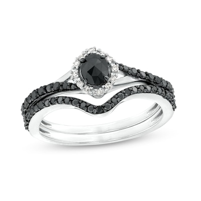 0.51 CT. T.W. Oval Black and White Diamond Frame Split Shank Bridal Set in 10K White Gold