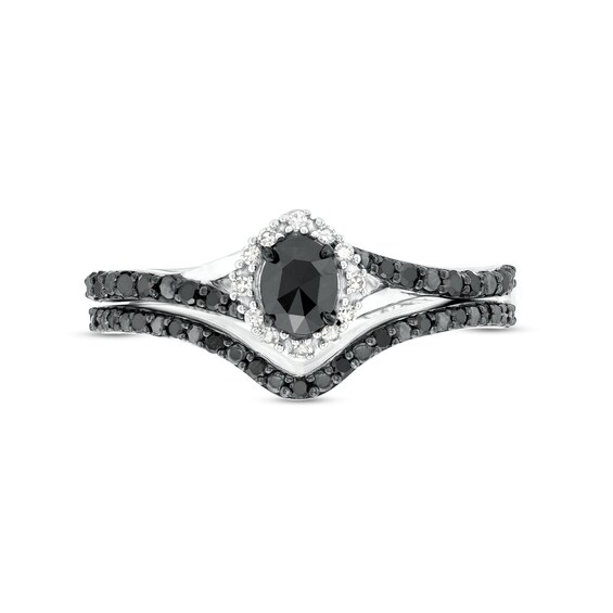 0.51 CT. T.W. Oval Black and White Diamond Frame Split Shank Bridal Set in 10K White Gold