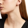 Thumbnail Image 1 of Baguette Cubic Zirconia Three Stone Hoop Earrings in 14K Gold