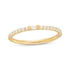 Thumbnail Image 0 of 0.18 CT. T.W. Baguette and Round Diamond Anniversary Band in 10K Gold