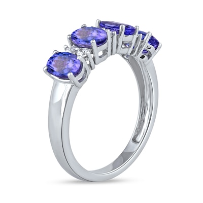 Oval Tanzanite and 0.15 CT. T.W. Diamond Alternating Anniversary Band in 10K White Gold