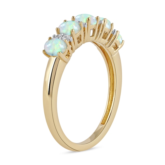 Oval Opal and 0.10 CT. T.W. Diamond Alternating Five Stone Anniversary Band in 10K Gold