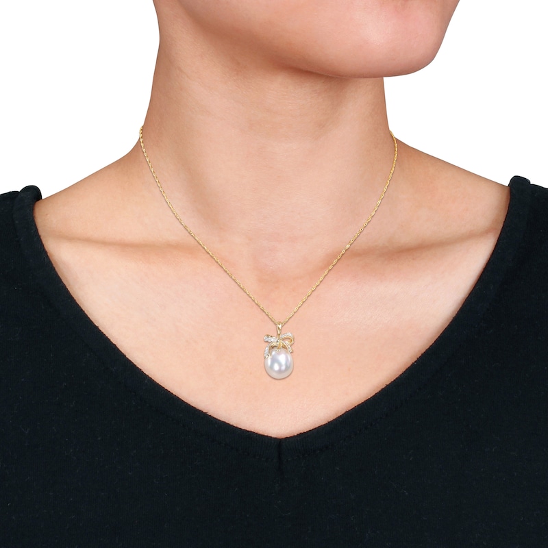 12.0-12.5mm Baroque South Sea Cultured Pearl and 0.08 CT. T.W. Diamond Bow Pendant in 10K Gold-17"|Peoples Jewellers