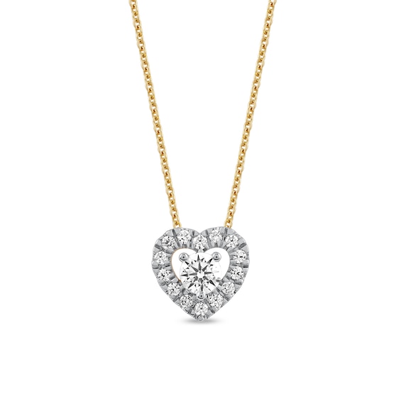 0.40 CT. T.W. Diamond Interior Stone Heart Frame Necklace in 10K Gold