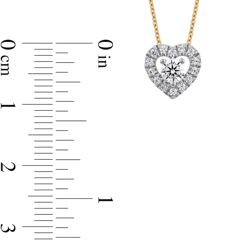 0.40 CT. T.W. Diamond Interior Stone Heart Frame Necklace in 10K Gold