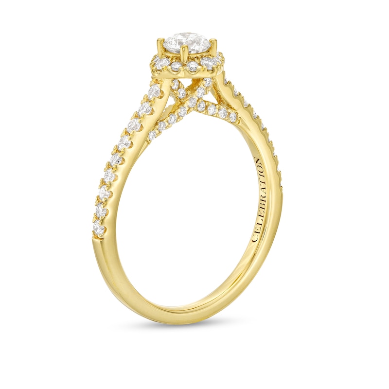 Celebration Infinite™ Canadian Certified Centre Diamond 0.69 CT. T.W. Tilted Frame Engagement Ring in 14K Gold (I/SI2)|Peoples Jewellers