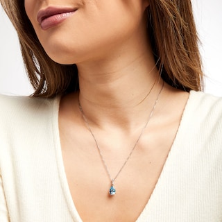 Pear-Shaped Swiss Blue Topaz Solitaire with Rope-Textured Bail Pendant in Sterling Silver and 10K Gold