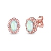 Thumbnail Image 1 of Oval Opal and 0.04 CT. T.W. Diamond Scallop Frame Art Deco Stud Earrings in 10K Rose Gold