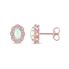 Oval Opal and 0.04 CT. T.W. Diamond Scallop Frame Art Deco Stud Earrings in 10K Rose Gold