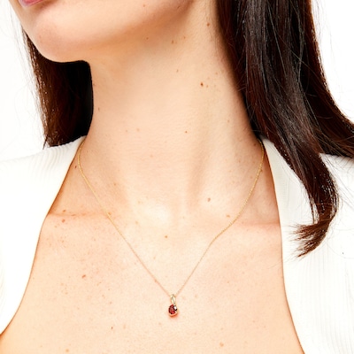 6.0mm Garnet Solitaire Curved Drop Pendant in 10K Gold