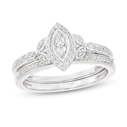 0.23 CT. T.W. Marquise-Shaped Multi-Diamond Frame Leaf-Sides Ribbon Shank Bridal Set in Sterling Silver