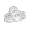 Oval White Lab-Created Sapphire and 0.45 CT. T.W. Diamond Frame Vintage-Style Art Deco Bridal Set in 10K White Gold