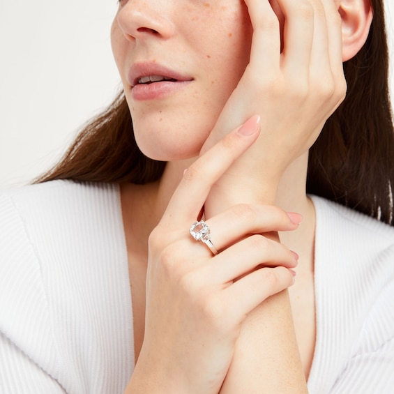 Emerald-Cut White Lab-Created Sapphire Three Stone Ring in Sterling Silver