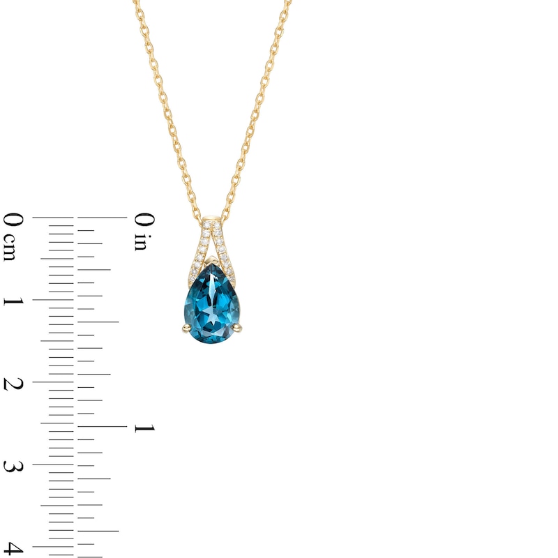 Pear-Shaped London Blue Topaz and 0.04 CT. T.W. Diamond Pendant in 10K Gold