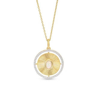 Oval Opal and 0.21 CT. T.W. Diamond Edge Medallion Pendant in 10K Gold