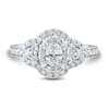 0.95 CT. T.W. Oval Diamond Clover Frame Tri-Sides Ring in 14K White Gold (I/I1)