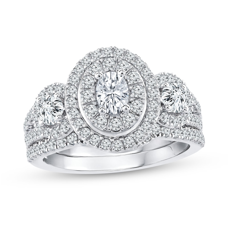 1.40 CT. T.W. Oval Diamond Frame Double Row Three Stone Bridal Set in 14K White Gold (I/I1)|Peoples Jewellers