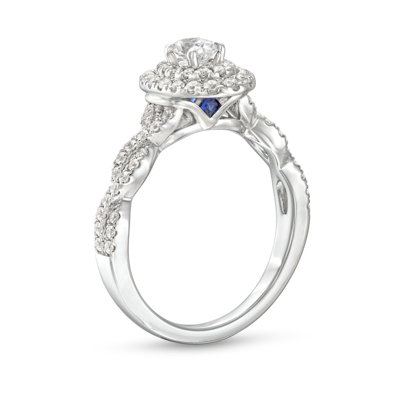 Vera Wang Love Collection Canadian Certified Oval Centre Diamond 0.69 CT. T.W. Twist Engagement Ring in 14K White Gold|Peoples Jewellers
