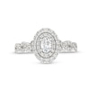 Vera Wang Love Collection Canadian Certified Oval Centre Diamond 0.69 CT. T.W. Twist Engagement Ring in 14K White Gold