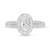 Vera Wang Love Collection Canadian Certified Oval Centre Diamond CT. T.W. Frame Engagement Ring in 14K White Gold