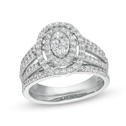 0.95 CT. T.W. Oval Multi-Diamond Triple Row Split Shank Bridal Set in 10K White Gold