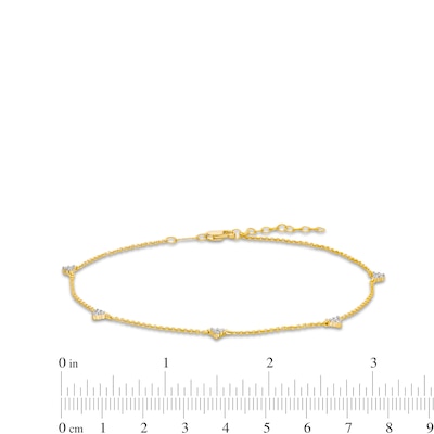 0.12 CT. T.W. Diamond Triangles Station Anklet in 10K Gold - 10"