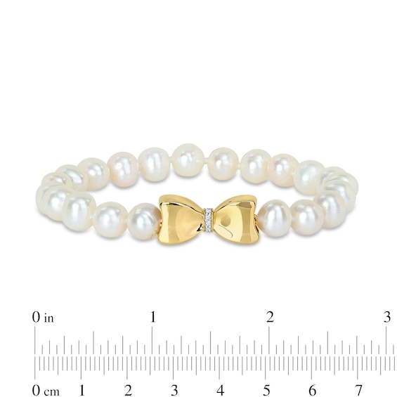 Eternally Bonded 7.0-7.5mm Freshwater Cultured Pearl Strand and 0.05 CT. T.W. Diamond Bow Stretch Bracelet with 10K Gold