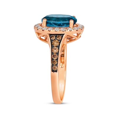 Le Vian® Oval Deep Sea Blue Topaz™ and 0.50 CT. T.W. Diamond Frame Ring in 14K Strawberry Gold®