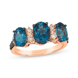 Le Vian® Oval Deep Sea Blue Topaz™ and 0.25 CT. T.W. Diamond Three Stone Ring in 14K Strawberry Gold®