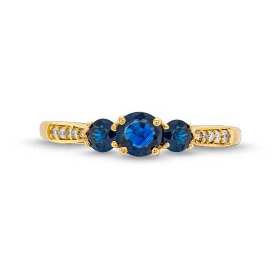 Blue Sapphire and 0.04 CT. T.W. Diamond Three Stone Ring in 10K Gold