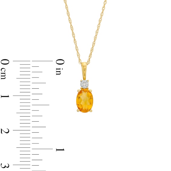 Oval Citrine and Diamond Accent Pendant and Stud Earrings Set in 10K Gold