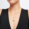 11.0mm Freshwater Cultured Pearl and 0.23 CT. T.W. Diamond Infinity Ribbon Pendant in 10K Gold