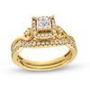 0.40 CT. T.W. Quad Princess-Cut Diamond Frame Twist Shank Bridal Set in 10K Gold