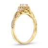 0.45 CT. T.W. Marquise Diamond Framed Twist Shank Engagement Ring in 10K Gold (I/I2)