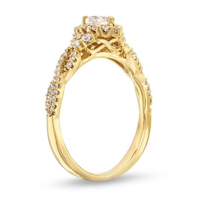 0.45 CT. T.W. Marquise Diamond Framed Twist Shank Engagement Ring in 10K Gold (I/I2)