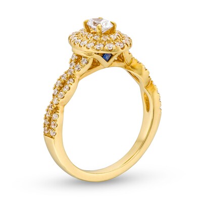 Vera Wang Love Collection Canadian Certified Oval Centre Diamond 0.69 CT. T.W. Twist Shank Engagement Ring in 14K Gold