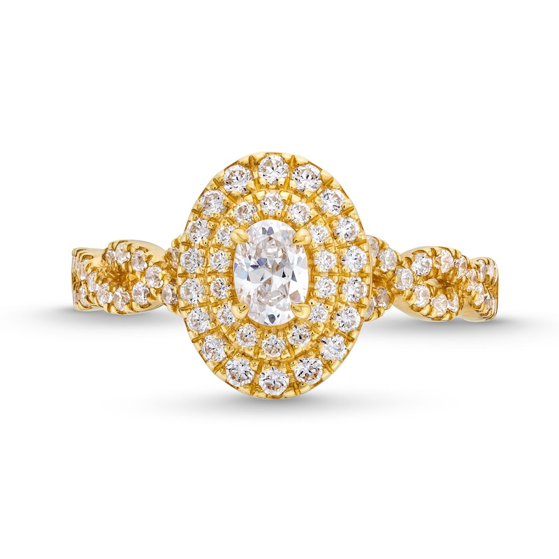 Vera Wang Love Collection Canadian Certified Oval Centre Diamond 0.69 CT. T.W. Twist Shank Engagement Ring in 14K Gold|Peoples Jewellers