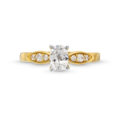 0.69 CT. T.W. Oval Diamond Leaf-Sides Engagement Ring in 14K Gold