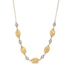 Thumbnail Image 0 of Italian Gold Bead Station Necklace in Hollow 18K Two Tone Gold