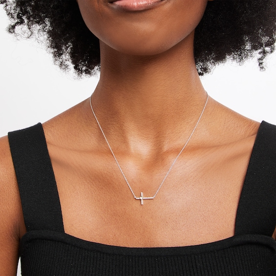 0.08 CT. T.W. Diamond Sideways Cross with Heart Necklace in Sterling Silver and 10K Gold