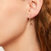 Thumbnail Image 1 of Wishbone Hoop Earrings in Hollow 10K Gold