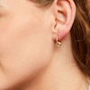Thumbnail Image 1 of Love Knot Hoop Earrings in Hollow 10K Gold
