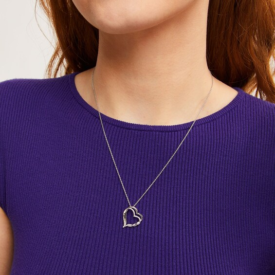 Circle of Gratitude® Collection 0.05 CT. T.W. Diamond Twist Tilted Double Heart Pendant in Sterling Silver - 19"