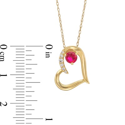 Lab-Created Ruby and 0.04 CT. T.W. Diamond Tilted Heart Pendant in 10K Gold