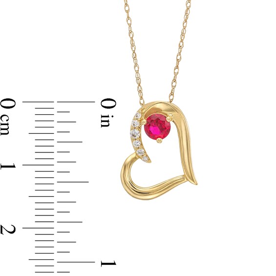 Lab-Created Ruby and 0.04 CT. T.W. Diamond Tilted Heart Pendant in 10K Gold