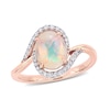 Thumbnail Image 0 of Oval Opal and 0.146 CT. T.W. Diamond Swirl Bypass Frame Ring in 10K Rose Gold