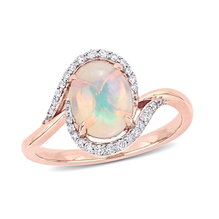 Oval Opal and 0.146 CT. T.W. Diamond Swirl Bypass Frame Ring in 10K Rose Gold