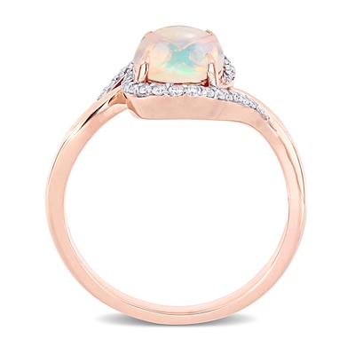 Oval Opal and 0.146 CT. T.W. Diamond Swirl Bypass Frame Ring in 10K Rose Gold