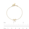 Thumbnail Image 1 of Child's Bow Bracelet in Solid 14K Gold - 5.5”