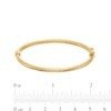 Thumbnail Image 1 of Child's 3.0mm Textured Bangle in Hollow 10K Gold - 5.5"